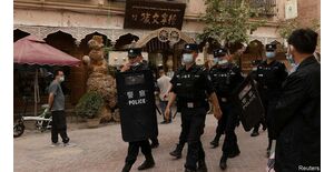 What is happening to the Uyghurs in Xinjiang?